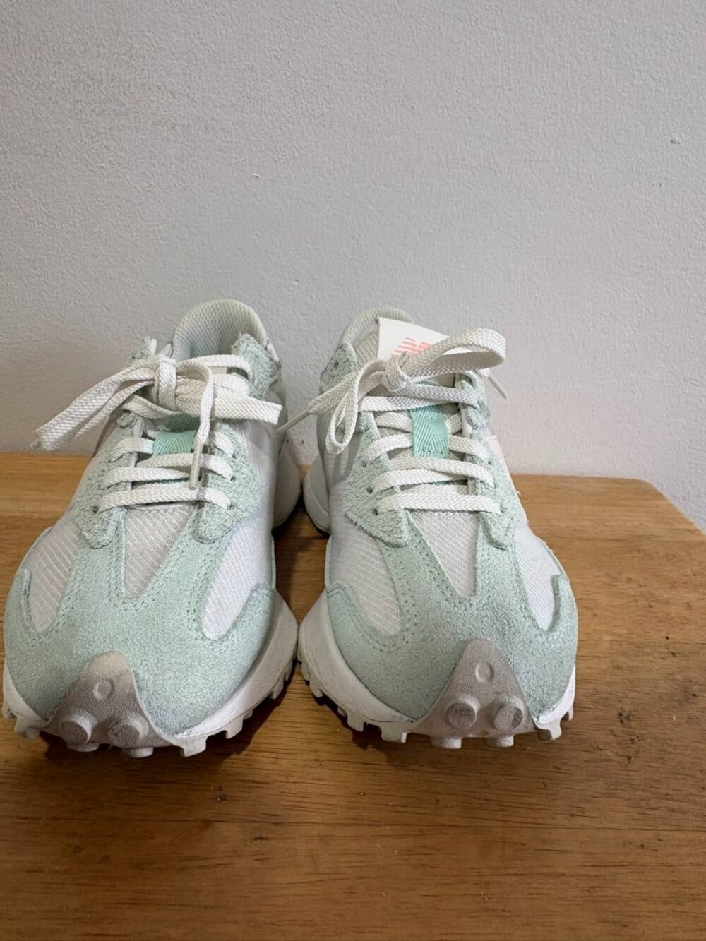 New Balance 327 sneakers in a white and mint green